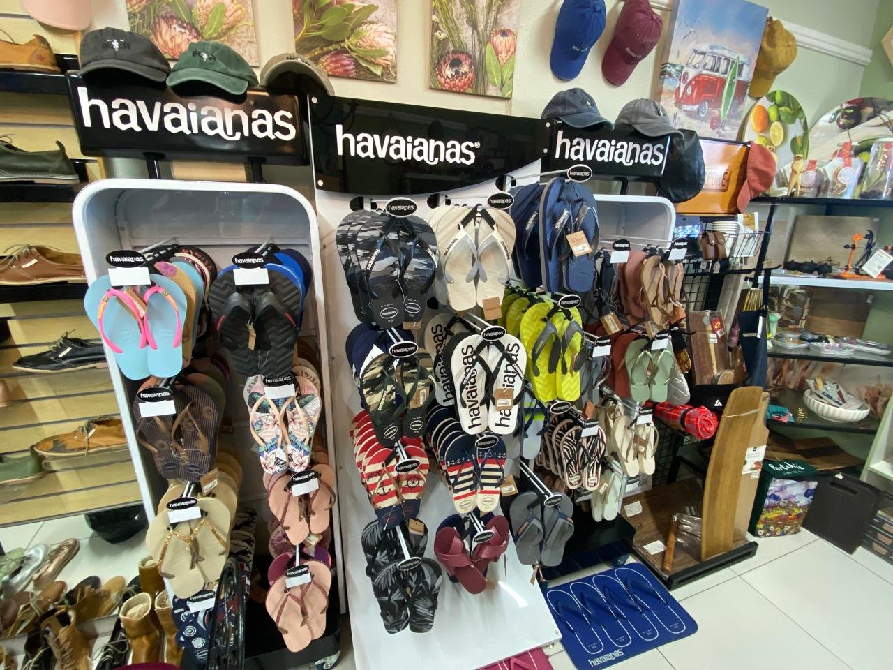 Two branded Havaianas stands at Mooi, filled with flip-flops in plain, printed and metallic colourways